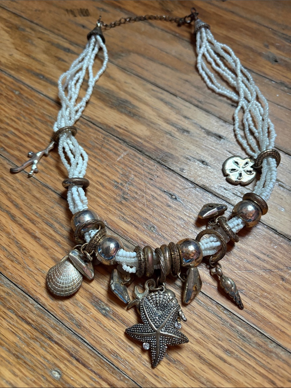 Beaded White and Gold Multi Strand Necklace with Antique Coastal Charms